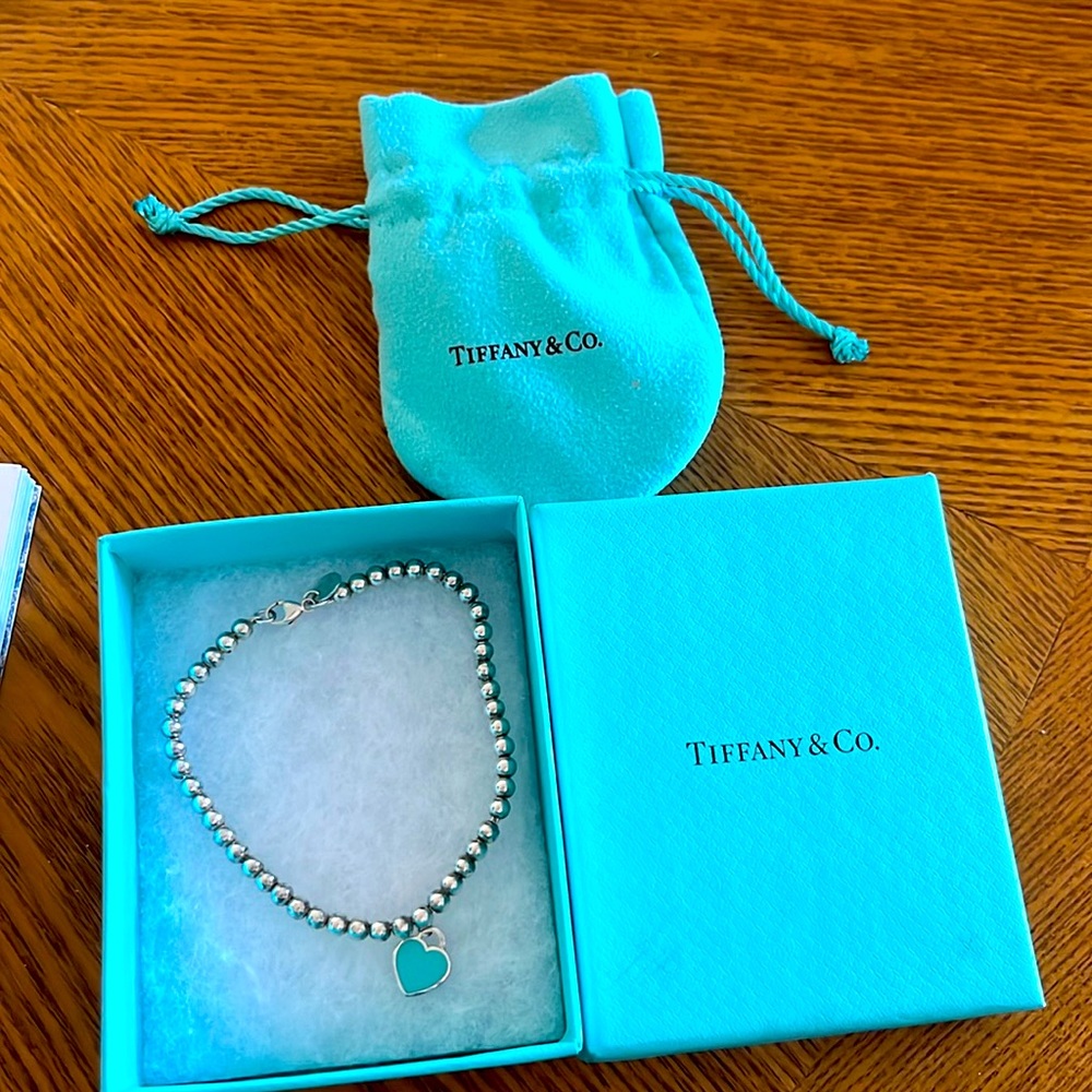 Tiffany & Co. sterling silver braclet with turquoise heart.